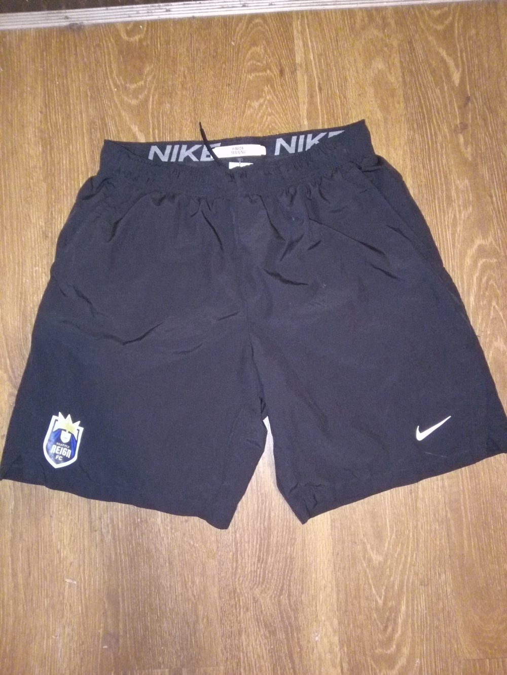 Nike Black Athletic Shorts with Swoosh and Team Patch